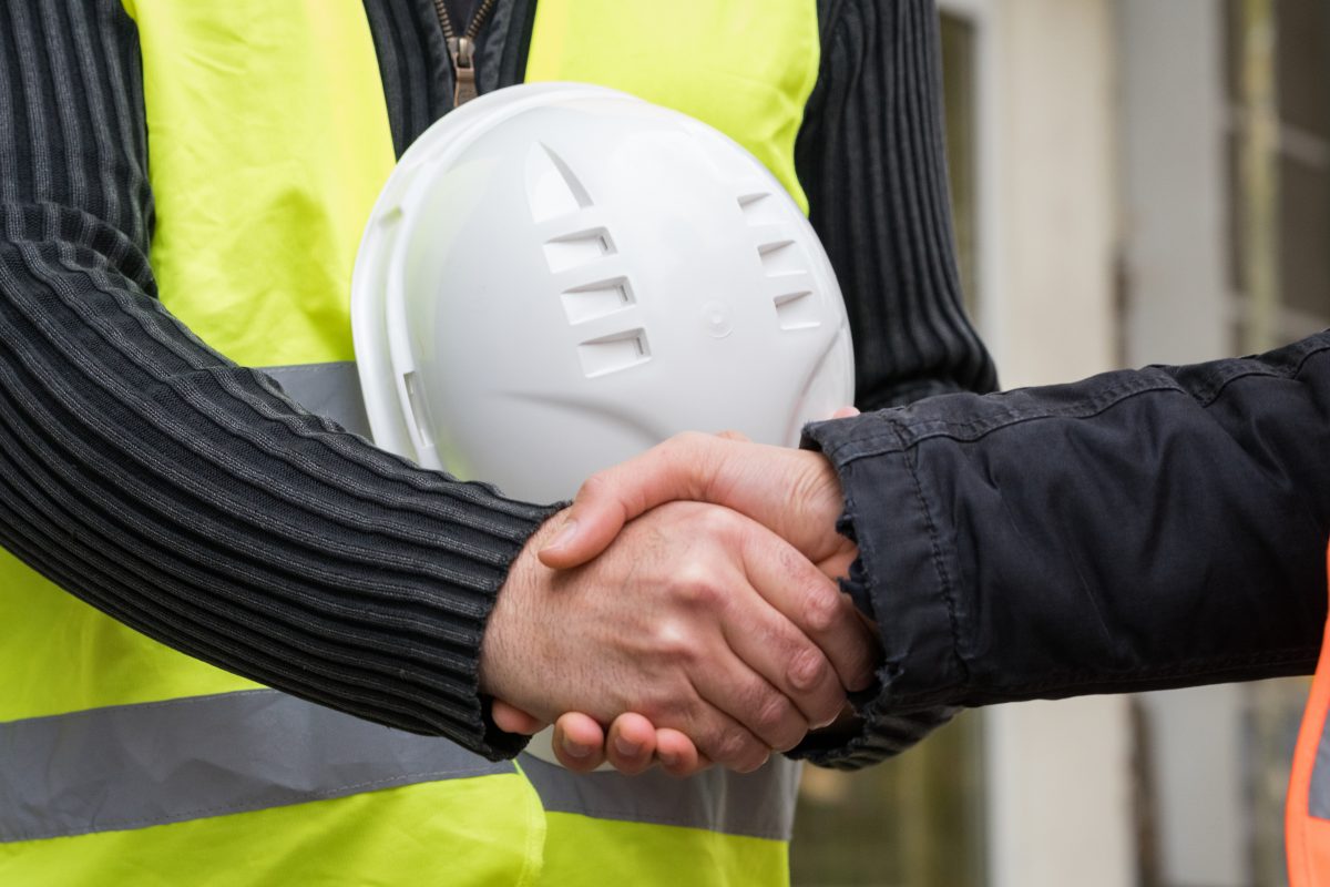Successful-handshake-deal-on-construction-site-875335358_3869x2579-1-e1542677563718